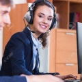 47014405-smiling-employees-of-customer-support-working-in-call-centre.jpg