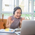 asian-businesswomen-is-using-notebook-computers-wear-headphones-online-meetings-working-from-home 33718-1735