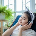beautiful-asian-women-wear-headphones-use-notebook-computer-work-listen-music-garden-home-relaxing-day 33718-1779