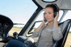 85066235-close-up-portrait-of-young-woman-helicopter-pilot