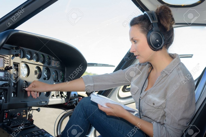 85393653-close-up-portrait-of-young-woman-helicopter-pilot.jpg