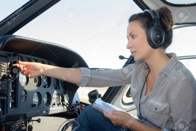 86371837-young-woman-helicopter-pilot.jpg
