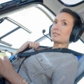 142053186-a-young-woman-helicopter-pilot