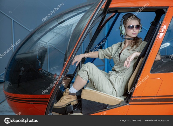 depositphotos 215777806-stock-photo-close-portrait-young-woman-helicopter