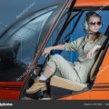 depositphotos 215777806-stock-photo-close-portrait-young-woman-helicopter