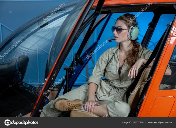 depositphotos 215777810-stock-photo-close-portrait-young-woman-helicopter