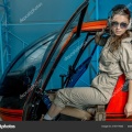depositphotos 215777820-stock-photo-close-portrait-young-woman-helicopter
