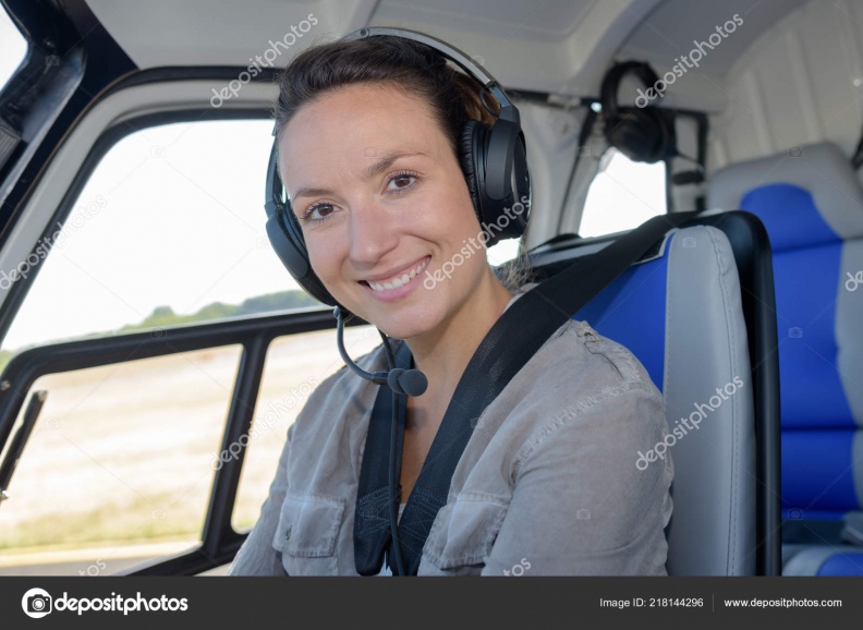 depositphotos 218144296-stock-photo-portrait-woman-helicopter-pilot