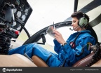 depositphotos 272744570-stock-photo-young-woman-helicopter-pilot-reading