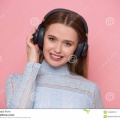beautiful-happy-young-woman-listen-music-using-mobile-application-isolated-white-106485010