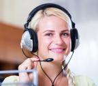 portrait-call-center-operator-smiling-blonde-office-58414259