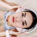 depositphotos 163336238-stock-photo-asian-woman-with-headphones