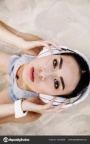 depositphotos 163336238-stock-photo-asian-woman-with-headphones