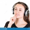 happy-woman-dreaming-listening-music-phone-headphone-white-144655497
