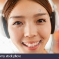 young-women-listening-to-music-portrait-X347D7