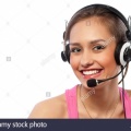 woman-with-a-headset-attractive-woman-with-headset-smiling-DA1MCC