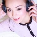 modern-woman-with-headphones-listening-music-X703PT