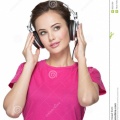 girl-enjoys-listening-to-music-headphones-isolated-white-background-68221060