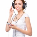 young-woman-enjoying-music-using-headphones-closeup-portrait-lovely-closing-her-eyes-isolated-over-white-46617449
