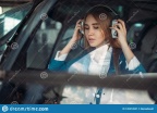 female-pilot-helicopter-view-windshield-headphones-sits-air-hostess-uniform-copter-private-airline-145212651