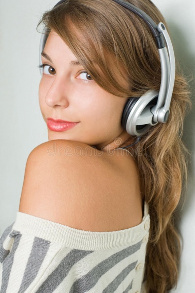 beautiful-young-brunette-wearing-headphones-18364839.jpg