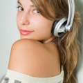 beautiful-young-brunette-wearing-headphones-18364839
