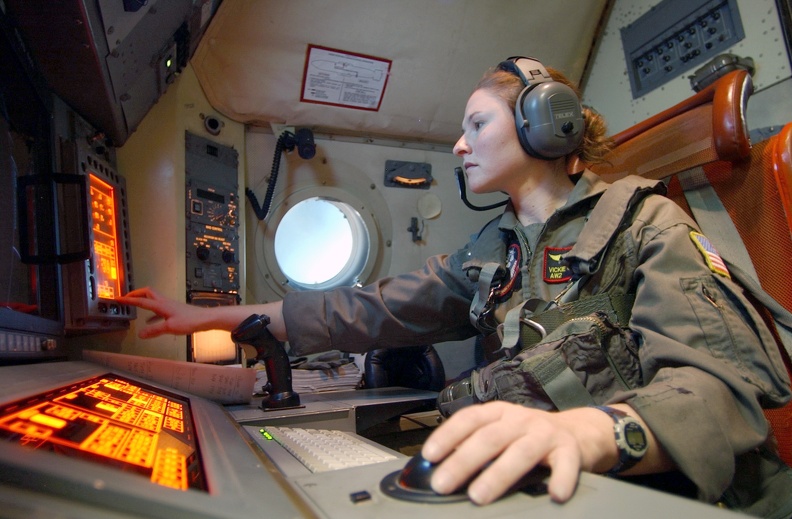 US_Navy_031011-N-5362A-001_Aviation_Warfare_Systems_Specialist_2nd_Class_Vickie_Cokely,_assigned_to_the_ Grey_Knights _of_Patrol_Squadron_Forty_Six_(VP-46),_works_from_her_assigned_sensor_bay_in_the_back_of_a_P-3C_O.jpg