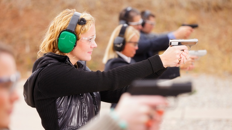 woman-green-ear-protection-at-range.jpg