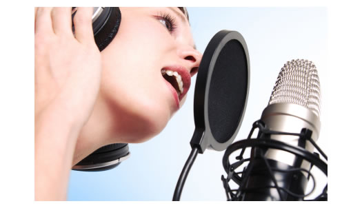 woman-recording-microphone-ear-phones.jpg