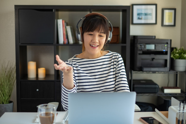 asian-woman-work-with-computer-home-listening-online-class-audio-program-with-headphone_139507-382.jpg